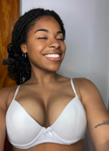Beautiful Awasa escort smiling during an intimate erotic massage session in Hawassa.